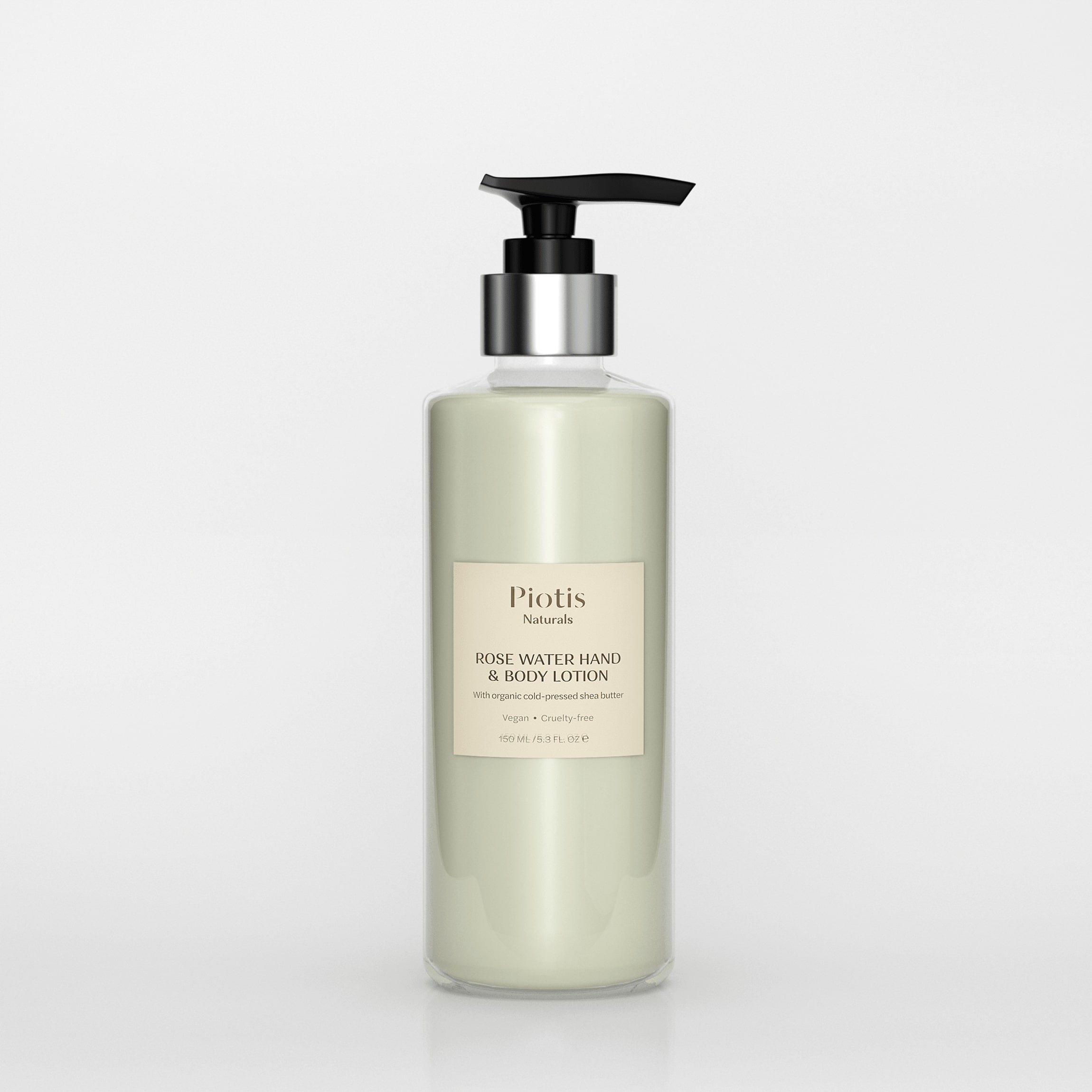 Piotis Naturals Rosewater Hand & Body Lotion in an elegant glass bottle with a sleek black pump. The label highlights its vegan and cruelty-free formulation, made with natural ingredients in Norwich, United Kingdom.